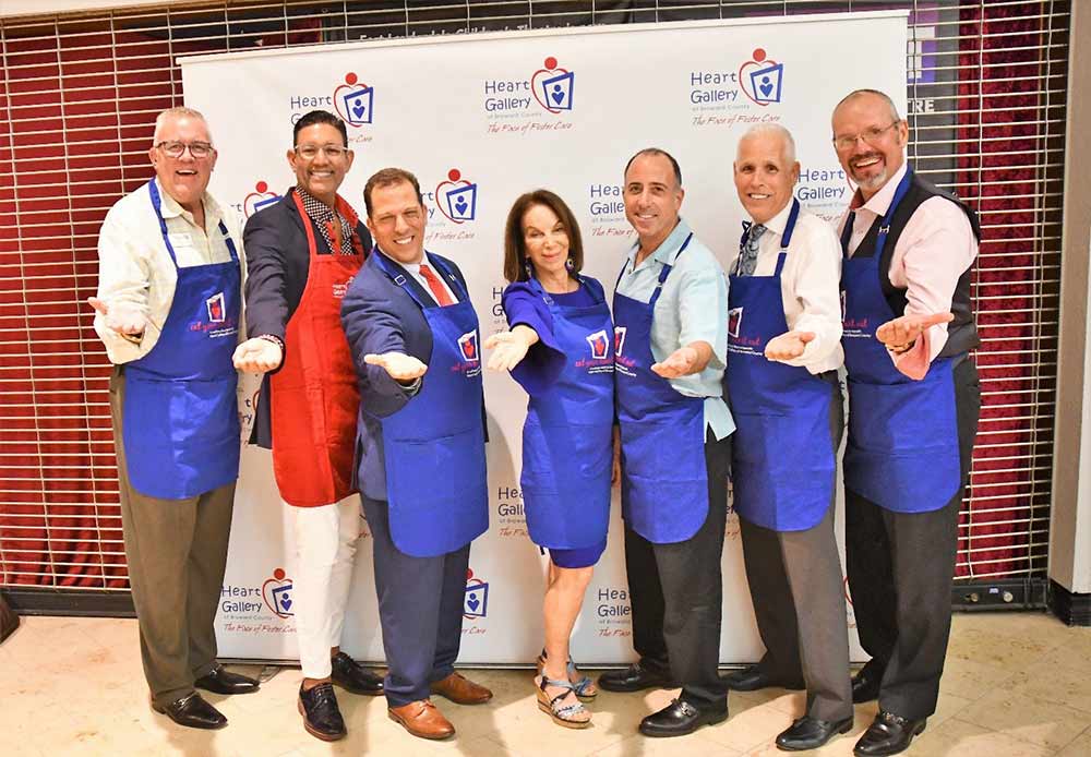 Photo Credit: Michael Murphy Photography Pictured from left to right from a past event: Celebrity servers Robert Boo, David Diaz, Justin Nepola, Ina Lee, Joe Feinberg, Mark Corbett, and Heiko Dobrikow.