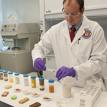 In an FDA laboratory, chemist Patrick Gray, Ph.D., prepares rice-based food samples for an analysis that will determine if arsenic is present and, if so, how much. 