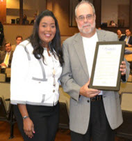 Mayor Barbara Sharief presents proclamation to Ed Stamm from ARRI CSC as part of Broward Means Business Initiative