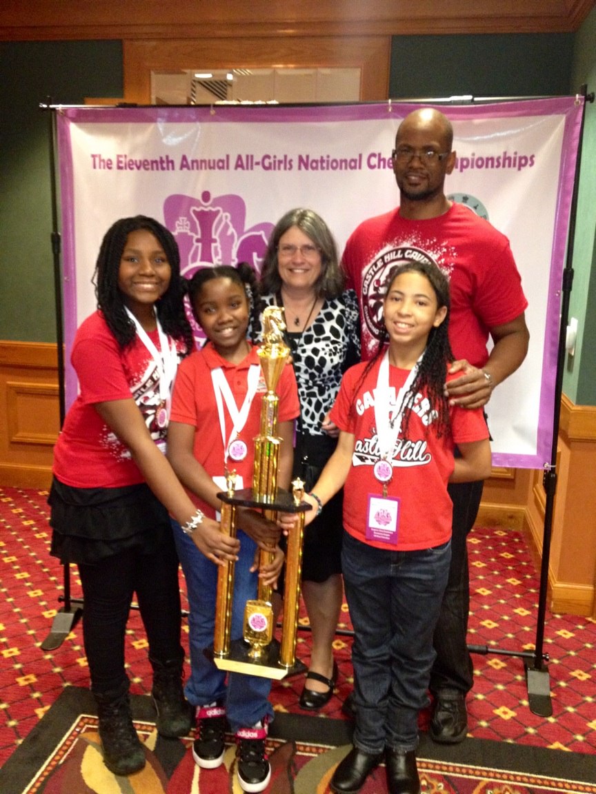 The Castle Hill Elementary all-girls chess team placed second in the nation at one of America’s most prestigious chess tournaments. From left to right: McKhaila McKenzie, Shyan Braswell, United States Chess Federation President Ruth Haring, Erykah Shaw, Coach Robert McKenzie. 